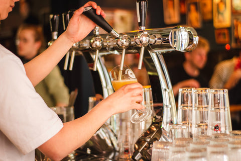 Best Breweries in Pittsburgh, Glass of Beer getting filled from a faucet