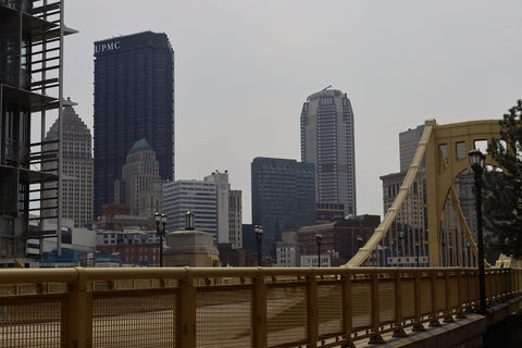 Downtown cityscape with bridge.