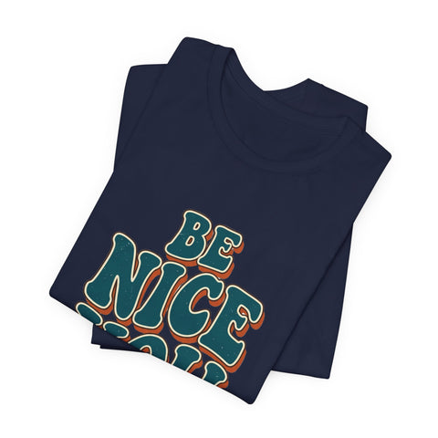 Be Nice You Jerk phrase tee | Retro groovy typography T-Shirt