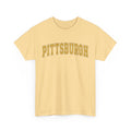 Light yellow unisex Pittsburgh t-shirt with bold vintage text, made from heavy cotton and ideal for casual wear.