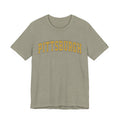 Front of olive green Vintage Classic Pittsburgh Short Sleeve T-Shirt with yellow arched text, perfect for everyday wear.