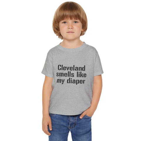 Toddler wearing gray Cleveland Smells Like My Diaper t-shirt, showcasing a playful design in soft cotton for children's casual outfits.