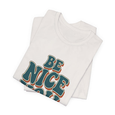Be Nice You Jerk phrase tee | Retro groovy typography T-Shirt
