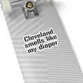 Funny Cleveland Smells Like My Diaper sticker on a festive gift box, great for novelty gift wrapping.