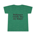 Heather green toddler T-shirt with black 'Baltimore smells like my diaper' text, a fun and sarcastic kidswear piece.