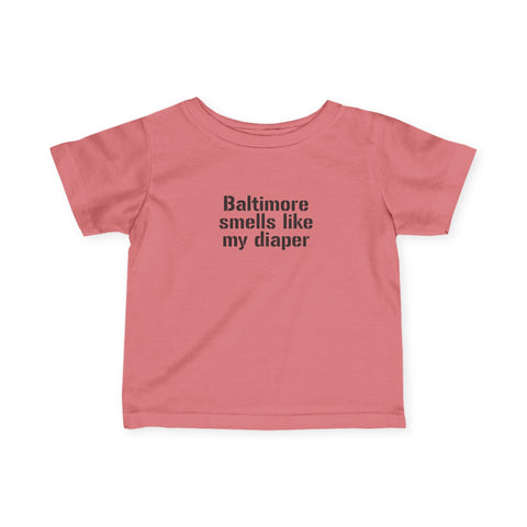 Coral pink infant jersey T-shirt with bold black 'Baltimore smells like my diaper' text for baby clothing.