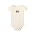 Cream-colored baby onesie featuring 'Cleveland smells like my diaper' slogan, soft and playful infant apparel.