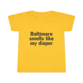 Bright yellow toddler T-shirt featuring the phrase 'Baltimore smells like my diaper' in black font, ideal for funny kids apparel.