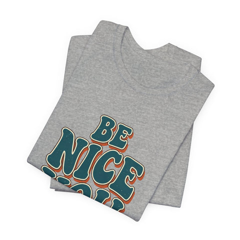 Be Nice You Jerk phrase tee | Retro groovy typography T-Shirt