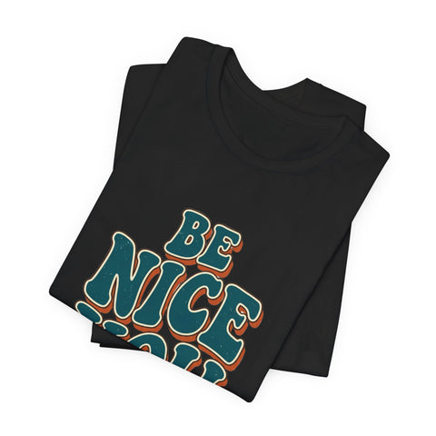 Be Nice You Jerk phrase tee | Retro groovy typography T-Shirt