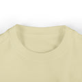 Close-up of beige infant T-shirt neckline, made from soft cotton for baby comfort.