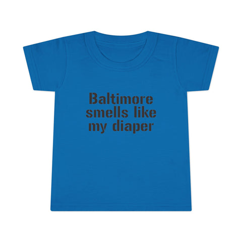 Royal blue toddler T-shirt with black 'Baltimore smells like my diaper' print, a funny and bold kids fashion statement.