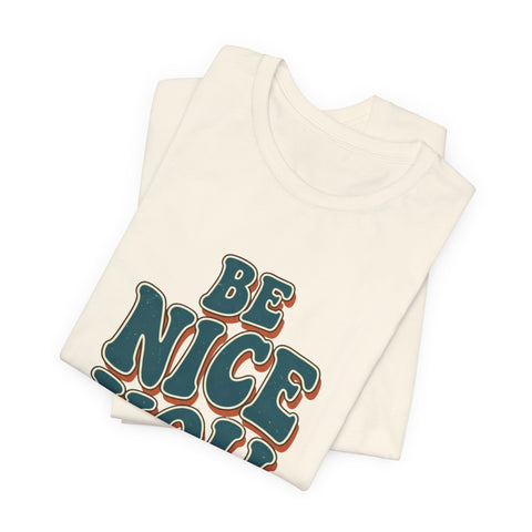 Be Nice You Jerk phrase tee | Retro groovy typography T-Shirt
