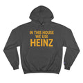 In This House We Use Heinz - Champion Hoodies Hoodie Printify Charcoal Heather S 