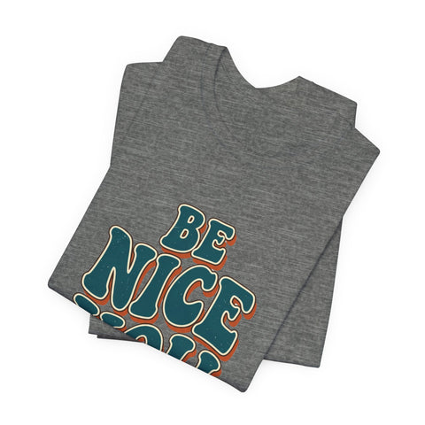 Be Nice You Jerk phrase tee | Retro groovy typography T-Shirt
