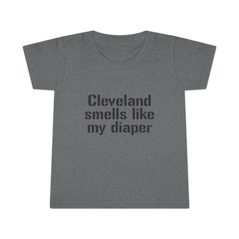 Dark gray toddler T-shirt with cheeky black lettering 'Cleveland smells like my diaper,' great for novelty kids apparel.