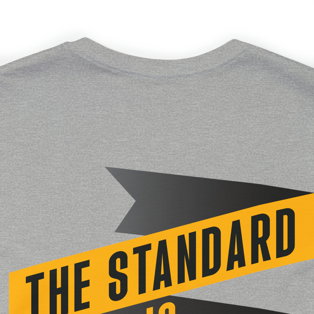The Standard Is The Standard - Banner - DESIGN ON BACK - Short Sleeve Tee T-Shirt Printify   