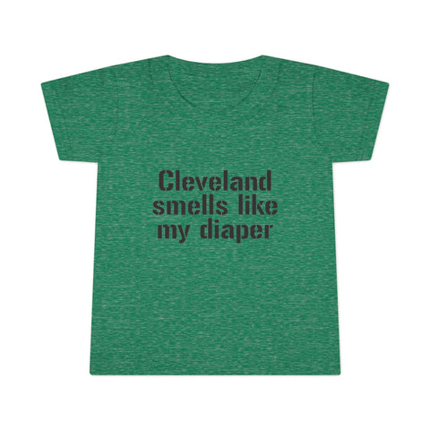 Heather green toddler T-shirt with the phrase 'Cleveland smells like my diaper' in black, a fun and bold kidswear option.